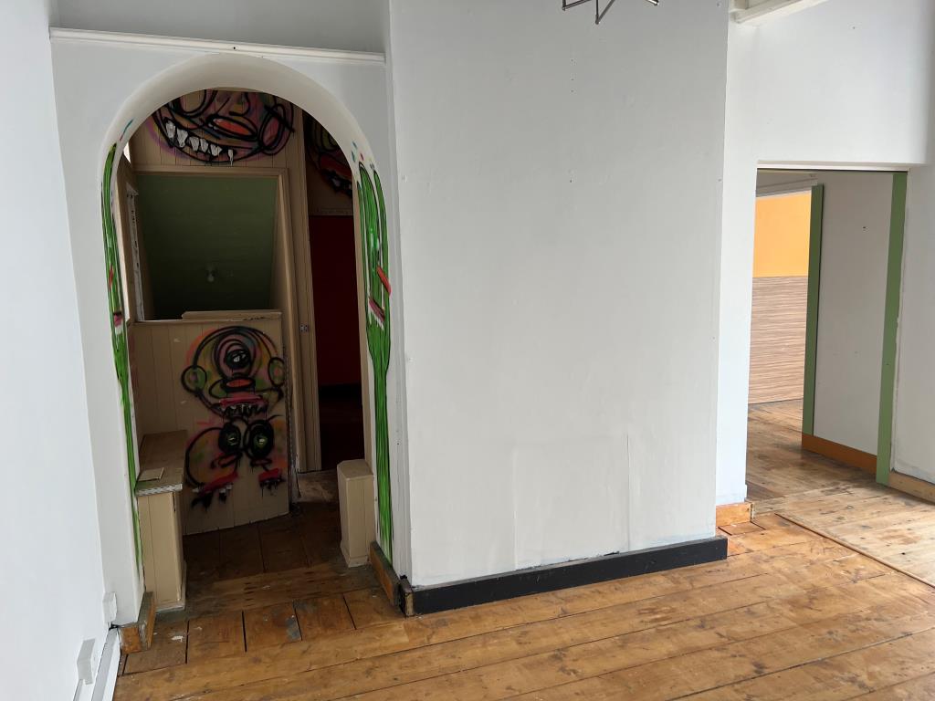 Lot: 47 - TWO STOREY TOWN CENTRE COMMERCIAL PREMISES - A View of the Rear of the Shop